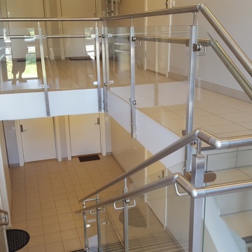 Shopping center overpass railing glass handrail