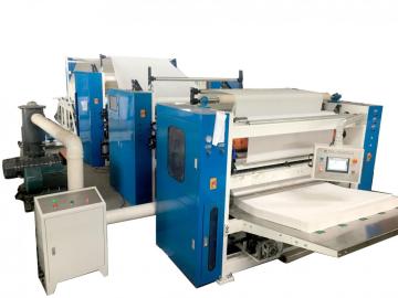 Multifold paper towel machine with lamination