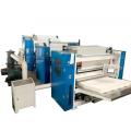 Multifold paper towel machine with lamination