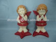red ceramic angel