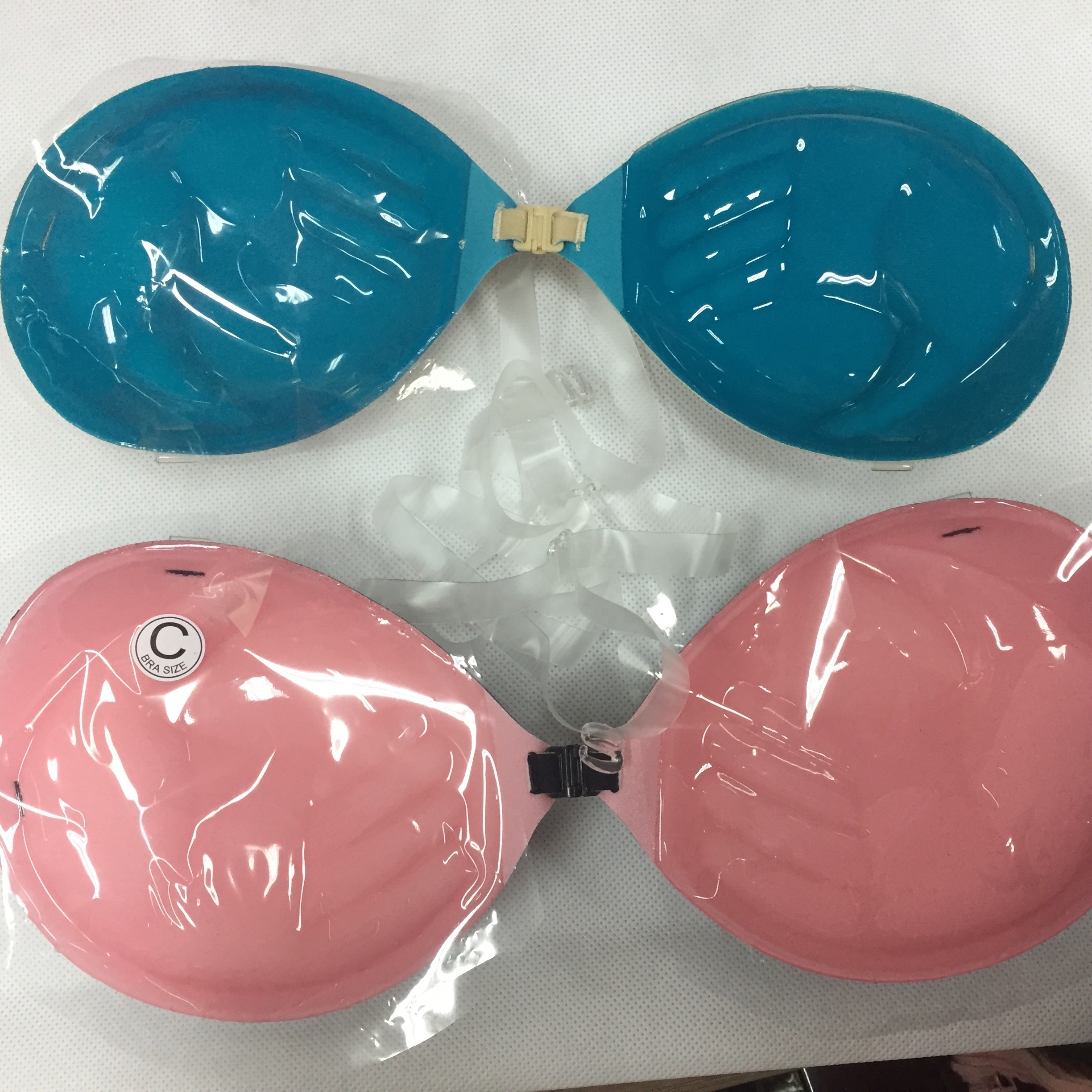 hot sale Thailand blue and pink color hand shape push up bra