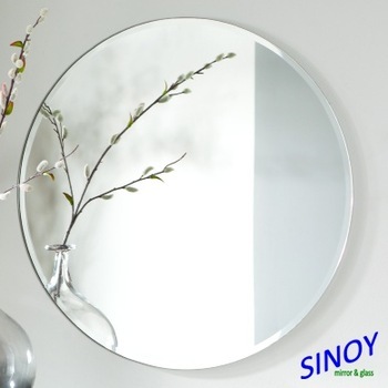 Illuminated beveled wall mirror