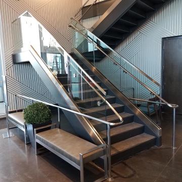 Simple glass railing for modern European stairs