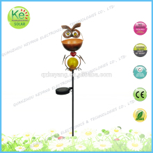 Metal animal head with a glass ball court solar light stake