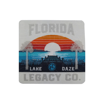 Silver silicone label printed on woven layer