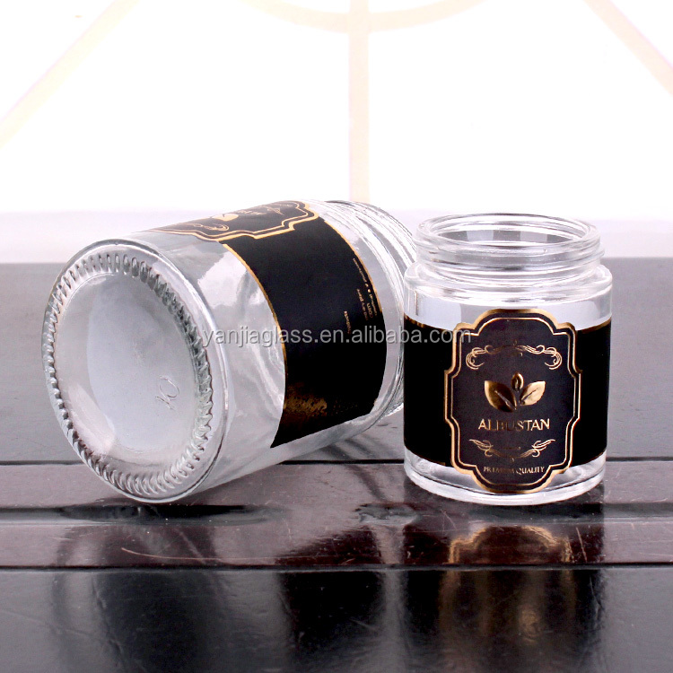 cheap cylinder 200ml glass jar with customized logo round glass jar with rose gold lid