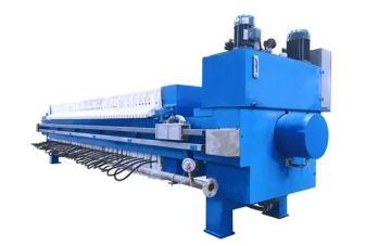 Automatic filter press with cloth washing system