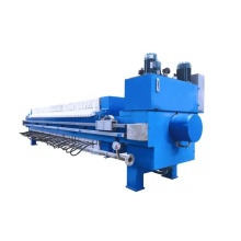 Automatic filter press with cloth washing system