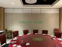 Hotel operable sliding hanging partitions