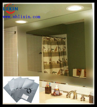 Heated pads for bathroom mirror