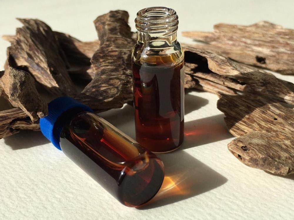 Price em massa por atacado Pure Natural Agarwood Oud Oil