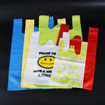 Bolsas de camiseta de plástico diseñadas personalizadas con Smiley blanca marrón amarilla