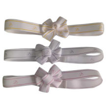 White satin ribbon bow with elastic loop