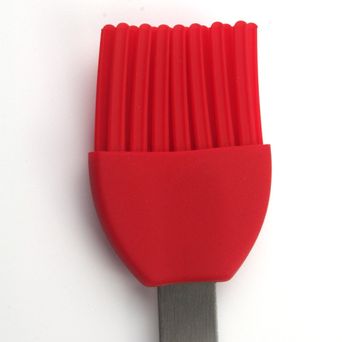 Pot de sauce barbecue avec brosse à badigeonner en silicone