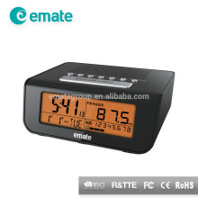Old digital alarm clock radio with 8 favorite radio stations setting up