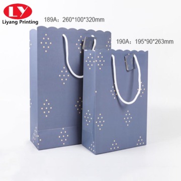Solid color carrier portable paper bag with wavy