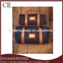 large cotton canvas duffle bag with leather trim