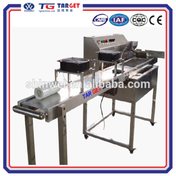 Chocolate enrobing machine