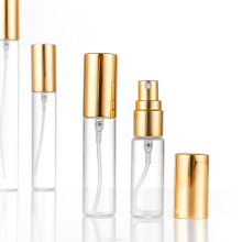 Small glass spray bottle for perfume