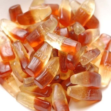Cola bottle shape gummy candy contains Vitamins A&C