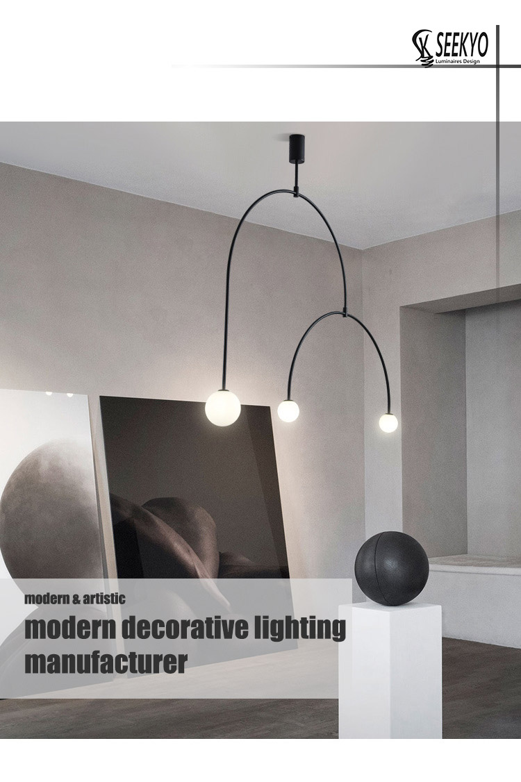 The semicircular balance 3 head glass ball pendant light is a stylish and modern lighting fixture that will add a touch of elegance to any room. The semicircular balance 3 head glass ball pendant light is a stylish and modern lighting fixture that will add a touch of elegance to any room.