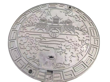 Artistic cast iron manhole cover