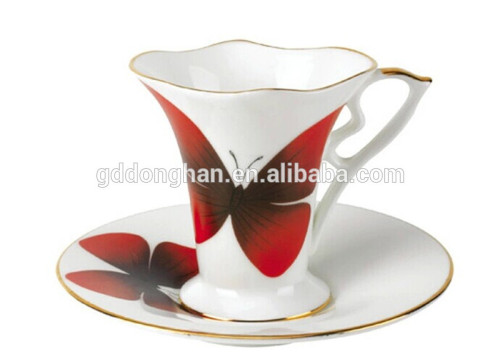 bone china tea cup and saucer with butterfly design with gold rimmed
