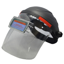 Auto-darkening grinding safety glasses with replacement lens