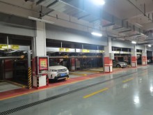 Two layer puzzle parking system of pit type