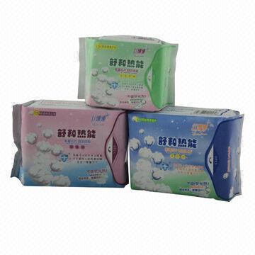 Sanitary napkin with absorbent paper core