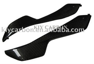 Carbon fiber side panels for motorcycles