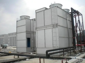 Packless spray cooling tower