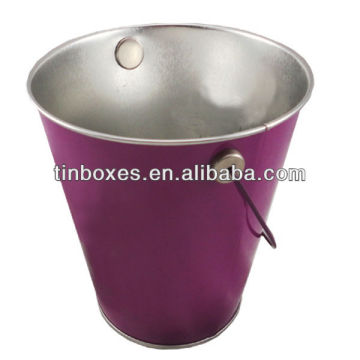 purple painted tin buckets