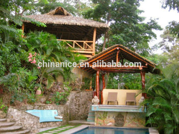 story deck using bamboo structure with Mexican rain cape thatch panels