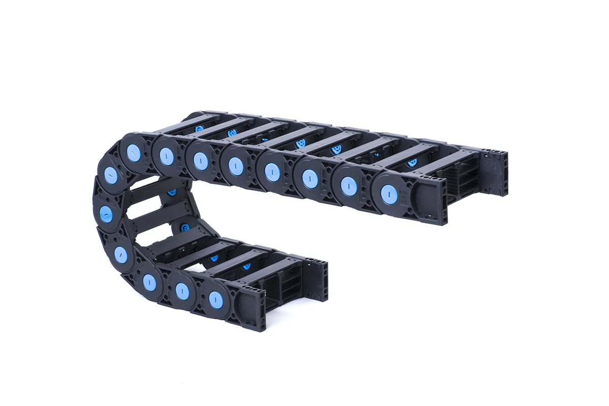 Reinforced plastic cable carrier with cross bars Reinforced plastic cable carrier with cross bars