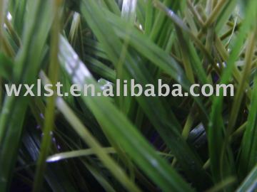 Artificial grass for soccer lands