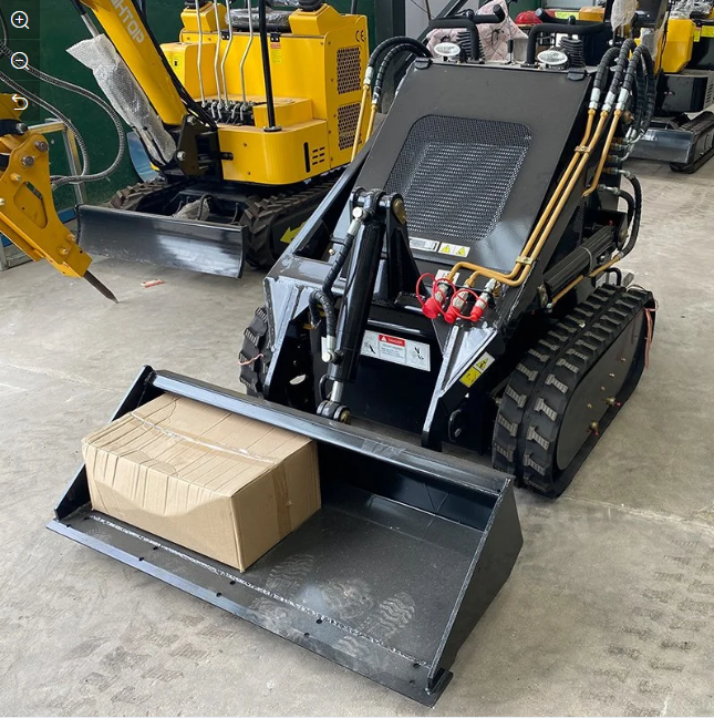 mini skid steer loader dengan hammer attchments