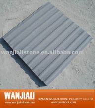 Tactile stone paving