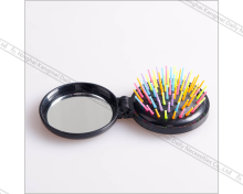 Travel essentials folding comb with mirror