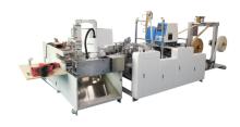 Handle fixing machine for paper bags