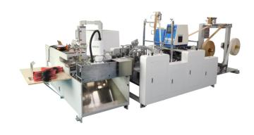 Handle fixing machine for paper bags