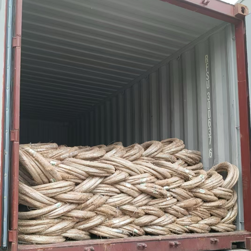 Cewki drutu ocynkowanego ładowane na eksport | ANJIA Shipping container loaded with hessian-wrapped galvanized wire coils ready for export -- manufactured by ANJIA