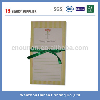 Fridge magnetic notepad on fridge