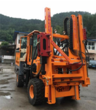 Highway guardrail piling/drilling rig