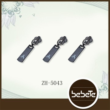 Reversible Zipper Sliders