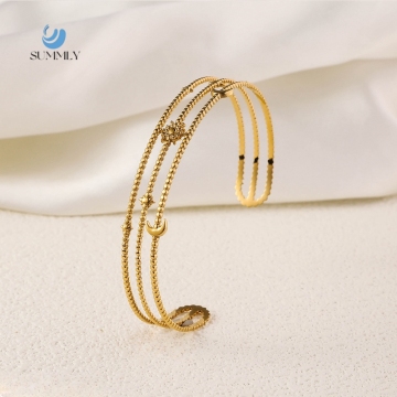 18K Gold Plated Titanium Steel Open Bracelet with Stars and Moons Design