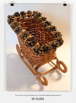 Chirstmas craft & wicker sled & wicker sleigh with pine cone decorate
