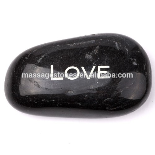 Black Polished river rocks word stone