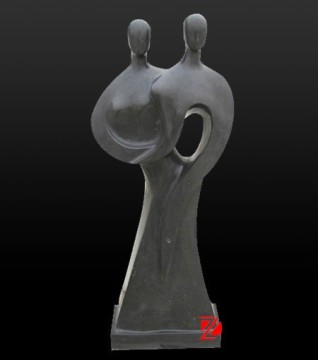 stone abstract couple statue