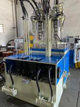 three servo two color vertical injection molding machine